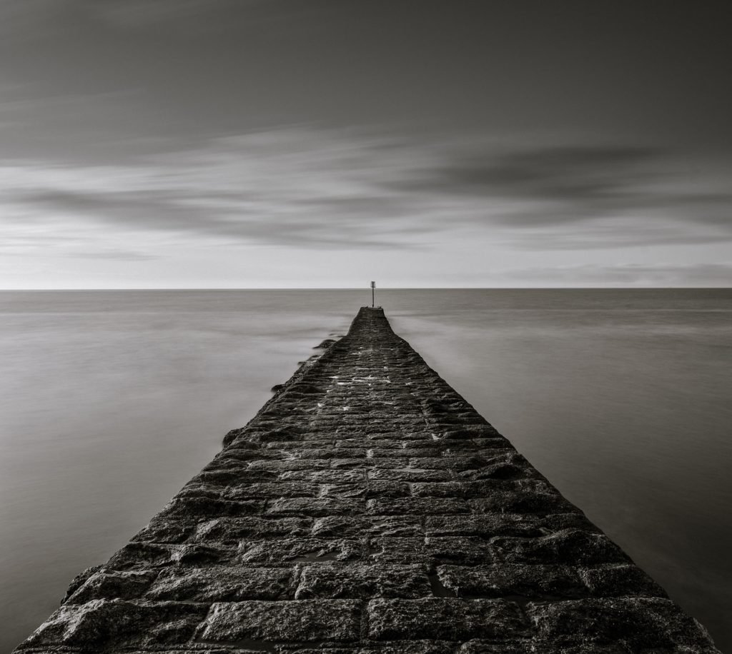 Long exposure photograph of a jetty at Dawlish Devon