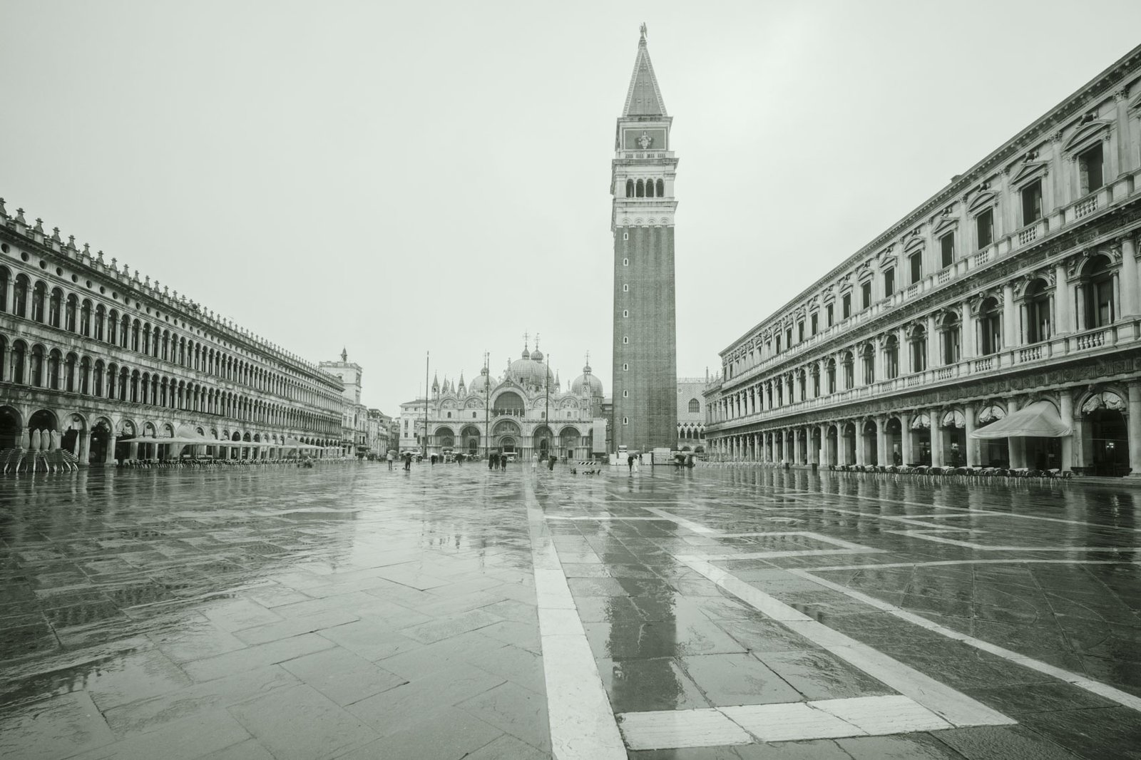 Venice 2025-3 Black and white photograph of St Mark’s Square in Venice with strong leading lines and figures fading into mist