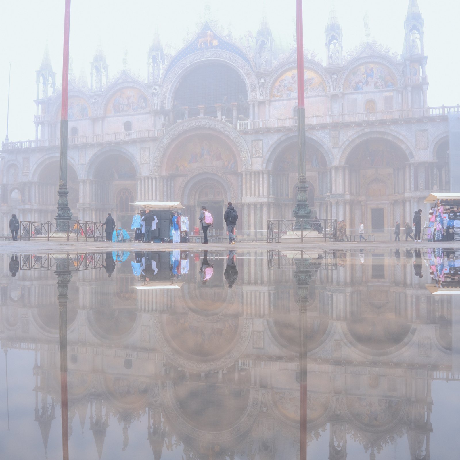 Reflections of the Basilica St Marks Square Venice